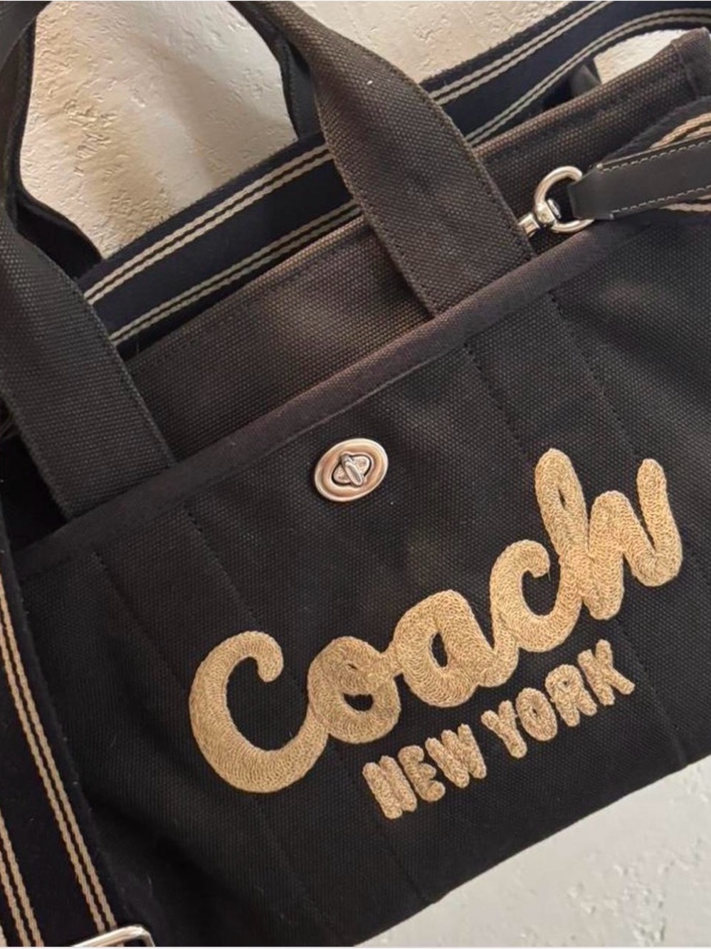 Coach Black Canvas Tote with Gold Embroidered Logo and Striped Strap